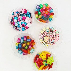 set de charms y lentejuelas